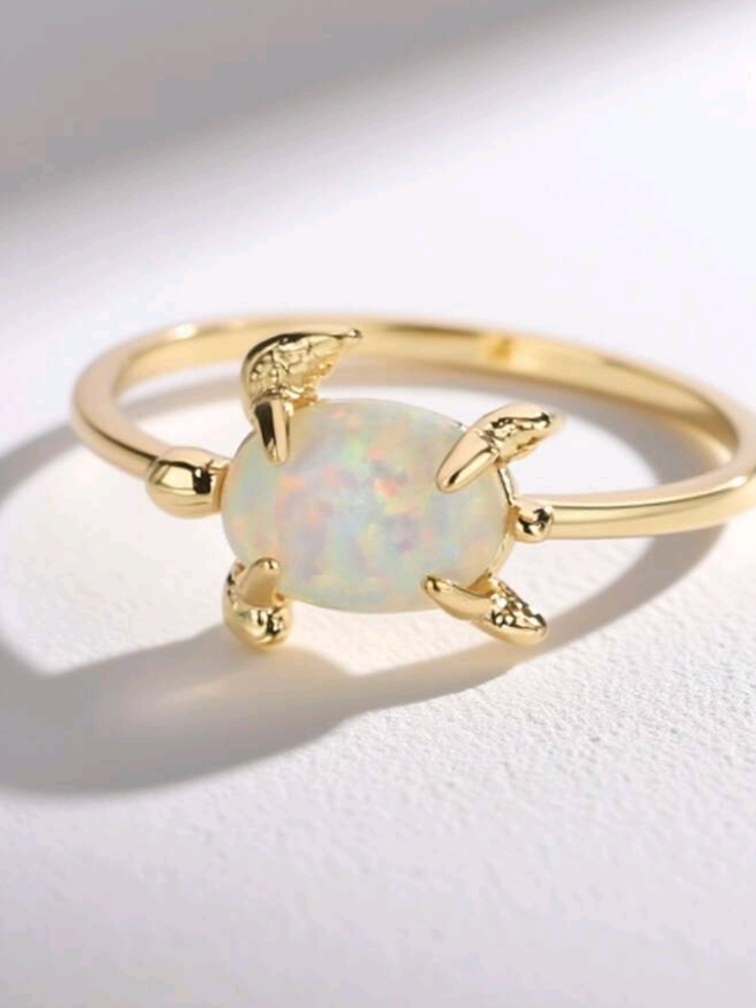 Gold Opal Oval Claw Ring  White Opal
